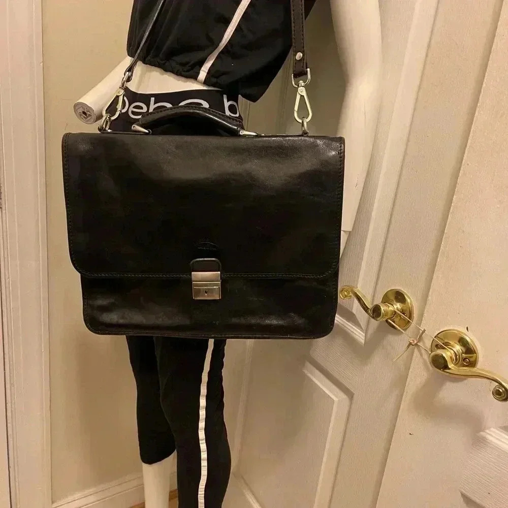 Vintage Hebella black Italian
Leather gold Clasp Front Across Body laptop bag